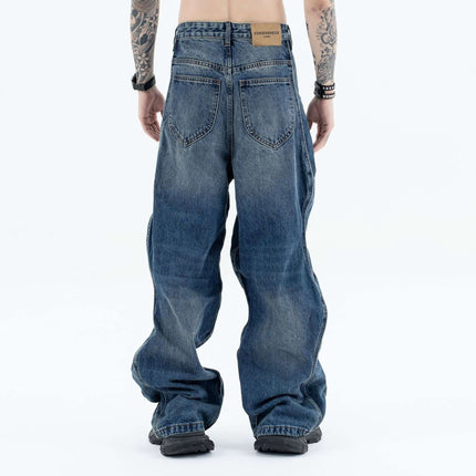 Wave Washed Distressed Jeans – Loose Fit showcased from the back, highlighting the relaxed fit and distressed details.