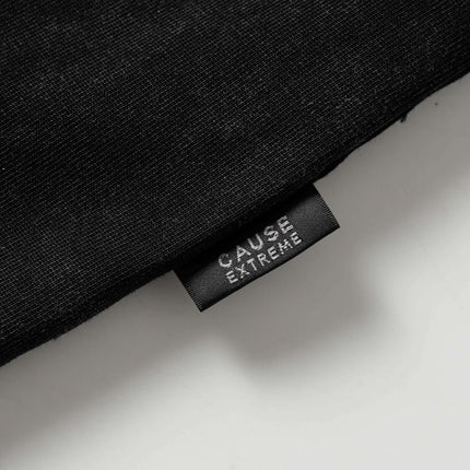 Washed Spliced Distressed T-Shirt – Loose Fit label showcasing premium quality and relaxed style.