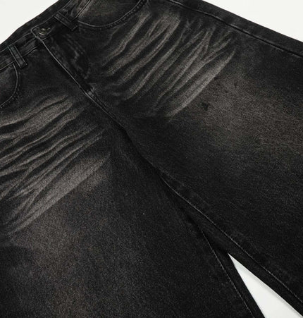Washed Black Vintage Knife Cut Jeans with cat whisker fade and relaxed fit.