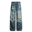 Model wearing Blue washed blue ripped jeans by Grozavu