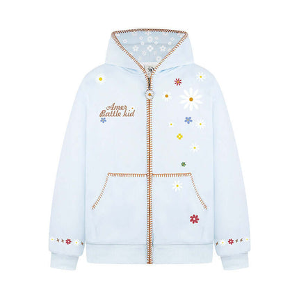 Close-up of Apricot floral embroidery hooded sweatshirt fabric