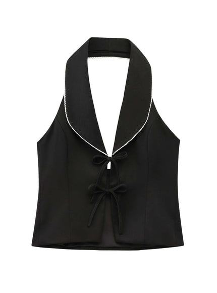 Model wearing black sleeveless bow decoration patchwork neck by Grozavu