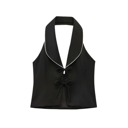 Model wearing black sleeveless bow decoration patchwork neck by Grozavu