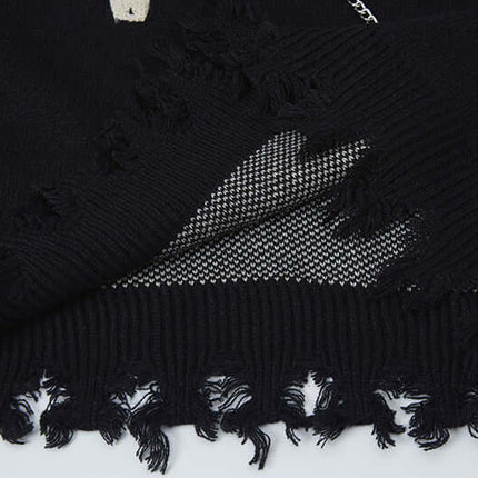 Suéter de punto jacquard cruzado – Corte holgado