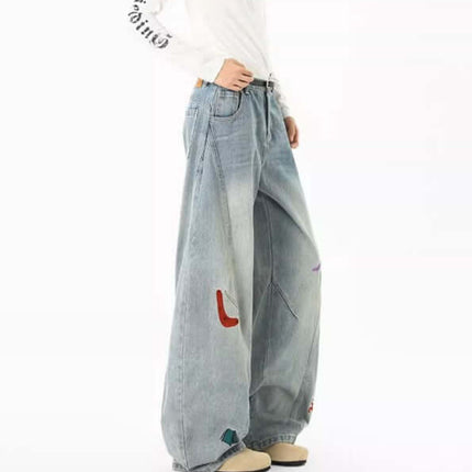 Knife-Cut Embroidered Pants – Loose Fit with unique knife-cut silhouette and bold embroidery accents in a relaxed fit.