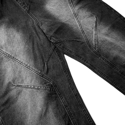 Distressed Pleated Reverse Denim Pants highlighting unique pleated panels and washed distressed finish.