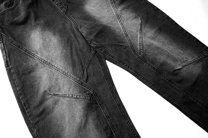 Pantalons en denim délavés usés plissés à revers de style urbain unisexe à jambes larges et droites