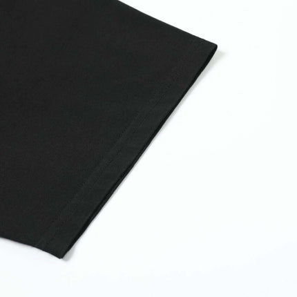 Washed Spray Print T-Shirt – Loose Fit close-up of the sleeve, showcasing relaxed style and premium fabric.