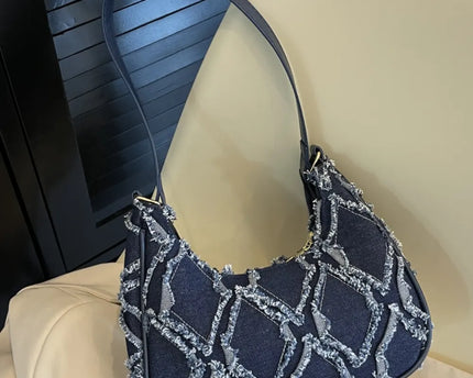 Sac à bandoulière en tissu à bords bruts