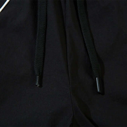 Close-up of the drawstring and stripe detailing on Tape Decorated Casual Wide-Leg Pants for a stylish urban look.