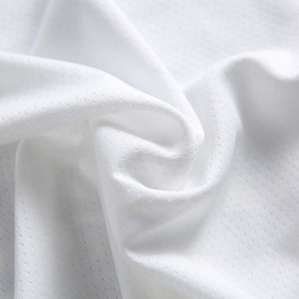 Close-up of soft, white fabric showcasing texture for Digital Print Jersey TShirt - Loose Fit.