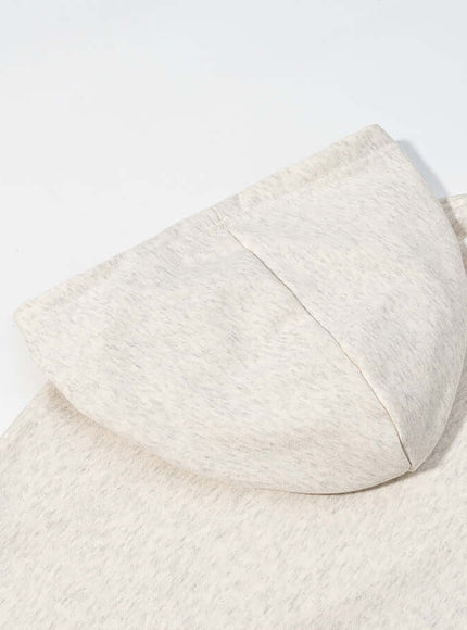 Close-up of gray animal pattern patchwork perforated sweatshirt fabric