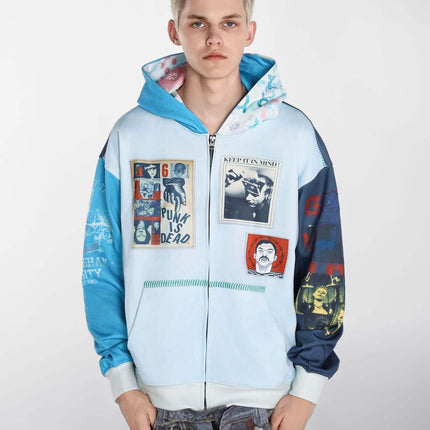 Magazine Printed Zip-Up Hoodie – Loose Fit featuring a male model showcasing a bold magazine-inspired print design.