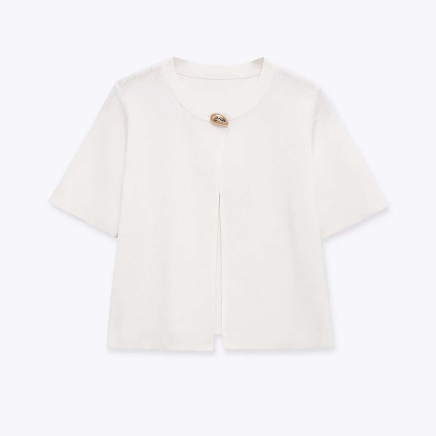 Close-up of White round neck simple knitted fabric