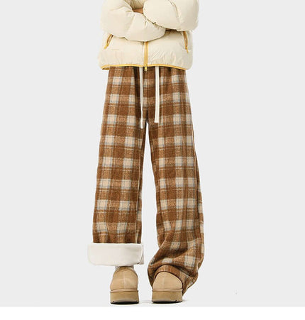 Fleece-Lined Winter Pants - Loose Fit paired with a cozy beige puffer jacket and winter boots.