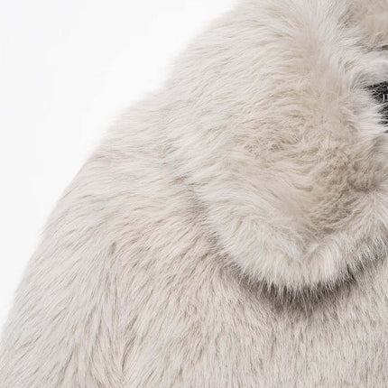 Manteau zippé en fausse fourrure – Coupe élégante