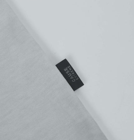 Retro Letter Print Hoodie – Loose Fit detail showing the label on a soft fabric background.