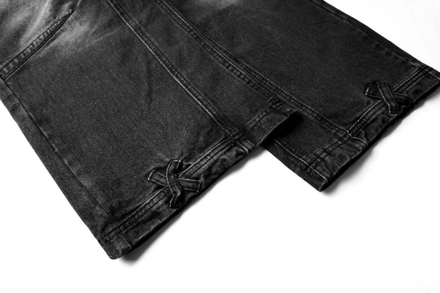 Pantalons en denim délavés usés plissés à revers de style urbain unisexe à jambes larges et droites