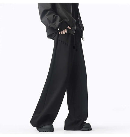 Model wearing Oversized Winter Casual Long Pants in black, showcasing street style and winter comfort.