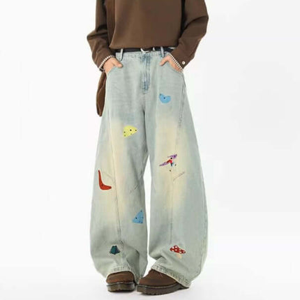 Knife-Cut Embroidered Pants – Loose Fit with unique colorful embroidery on relaxed denim for modern street style.