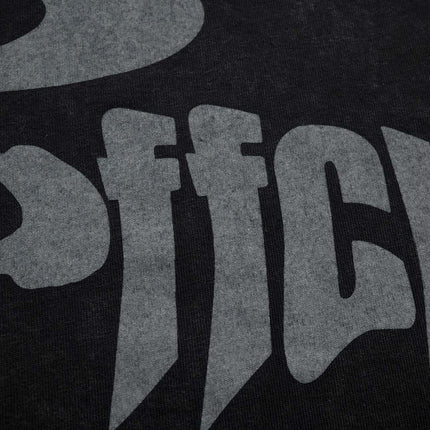 Close-up of the bold letter graphic on the Retro Washed Letter T-Shirt – Loose Fit, showcasing its relaxed style.