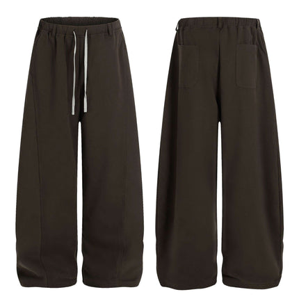Solid Knife Pants - Loose Fit in dark color, showcasing wide-leg design and adjustable drawstring for comfort.