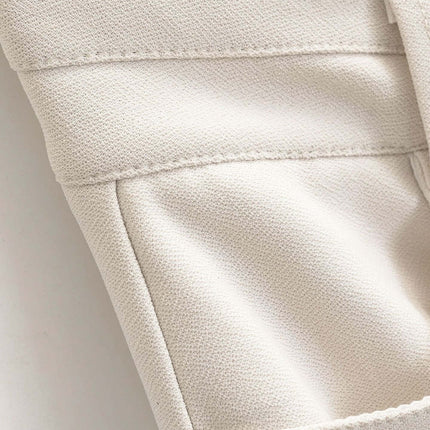 Detail of High Elastic Micro Flare Casual Pants showing smooth fabric and stylish design.