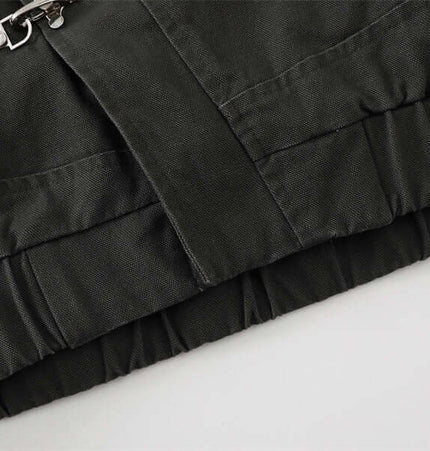 Detail of the Grozavu Stand Collar Casual Jacket – Loose Fit showcasing zipper and ruffled hem.