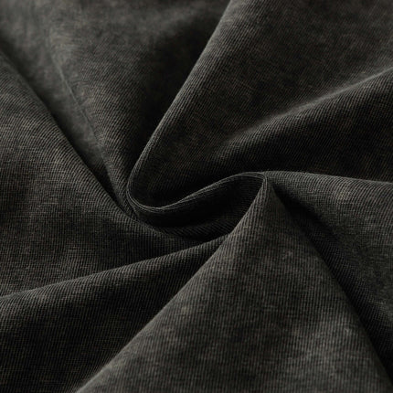 Close-up of the fabric texture of the Retro Washed Pocket Embroidery T-Shirt – Loose Fit, showcasing premium cotton softness.