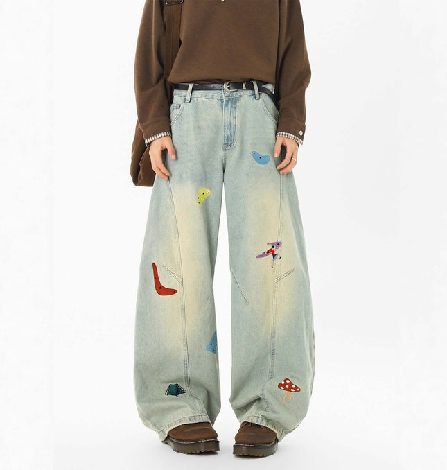 Embroidered Patchwork Denim Pants featuring colorful patches, designed for trendy urban streetwear.