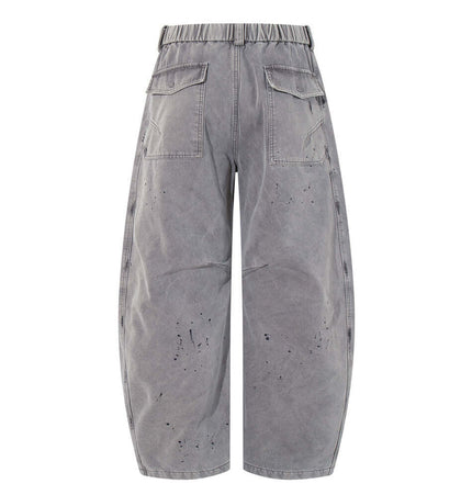 Back view of Patchwork Distressed Knife Pants with cargo pockets and a rugged, distressed finish.