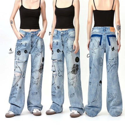 Distressed Denim Graffiti Print Trousers featuring bold graffiti designs and a relaxed fit, perfect for street style.