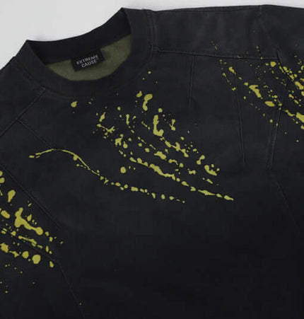 Ripped Gradient Long Sleeve TShirt with abstract yellow splatter design on black fabric.