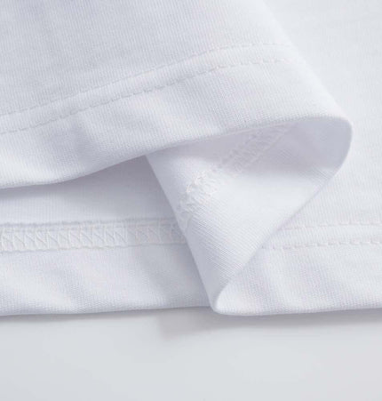 Close-up of the soft cotton fabric and stitching details of the Retro Washed Face Letter TShirt – Loose Fit.