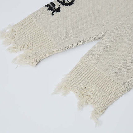 Suéter de punto jacquard cruzado – Corte holgado