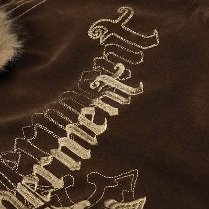 Close-up of the Warm Cotton Jacket with Fur Collar – Loose Fit showcasing unique embroidery and fur detail.