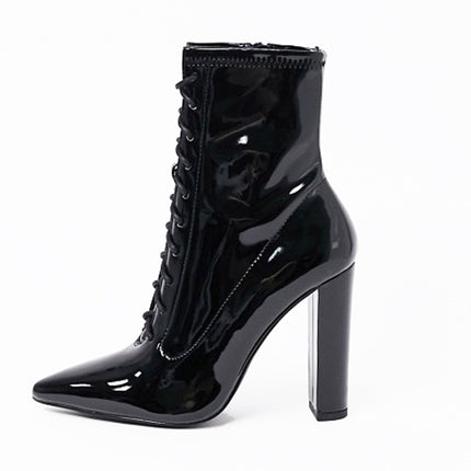 Sleek & Stylish: Black Patent Leather Ankle Boots at €110.00