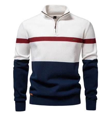 Stand Collar Half-Zip Knit Sweater in color-blocked style with stand-up collar and half-zip closure.