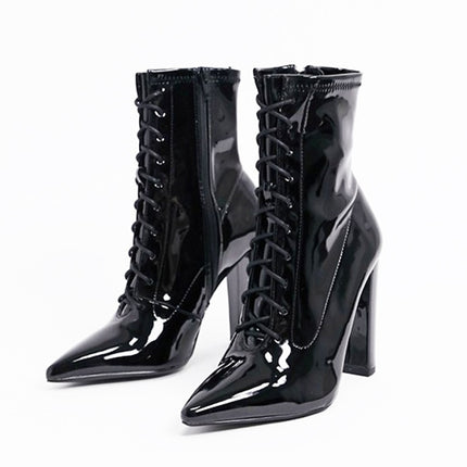 Sleek & Stylish: Black Patent Leather Ankle Boots at €110.00