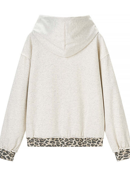 Model wearing gray animal pattern patchwork perforated sweatshirt by Grozavu