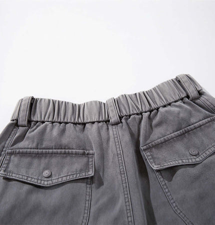 Patchwork Distressed Knife Pants showing elastic waistband and pockets, highlighting street style and comfort.