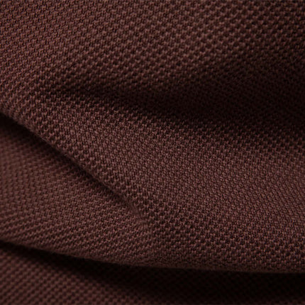 Close-up of soft brown fabric used in the Stand Collar Half-Zip Knit Sweater.