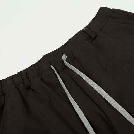 Close-up of the waistband and drawstring of Solid Knife Pants - Loose Fit.