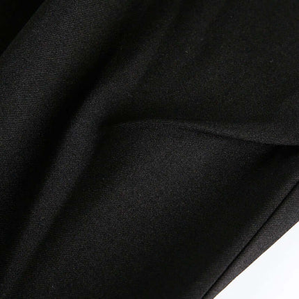 Close-up of fabric texture used in Wide Leg Pleated Plaid Trousers, showcasing the smooth and breathable material.