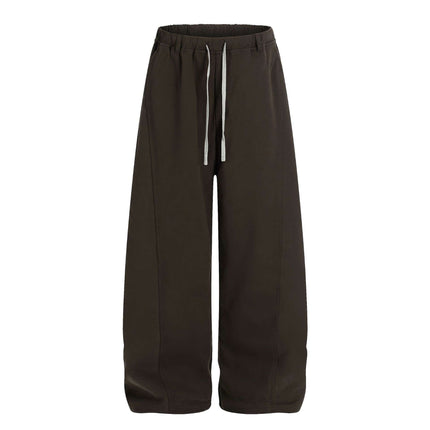 Solid Knife Pants - Loose Fit in dark color with adjustable drawstring and wide-leg design for relaxed comfort.