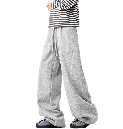 Heavyweight Wide-Leg Pants - Loose Fit worn with a striped long sleeve shirt, showcasing a relaxed and stylish look.