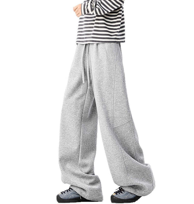 Heavyweight Wide-Leg Pants - Loose Fit worn with a striped long sleeve shirt, showcasing a relaxed and stylish look.
