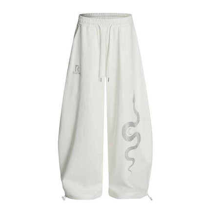 Back side view of Rhinestone Snake Print Pants by Grozavu brand streetwear