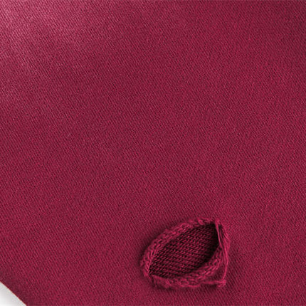 Close-up view of the Grozavu Half-Zip Printed Hoodie – Loose Fit fabric detail with a distinctive burgundy color feature.