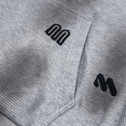 Sudadera con capucha con cremallera bordada de letras desgastadas – Corte holgado